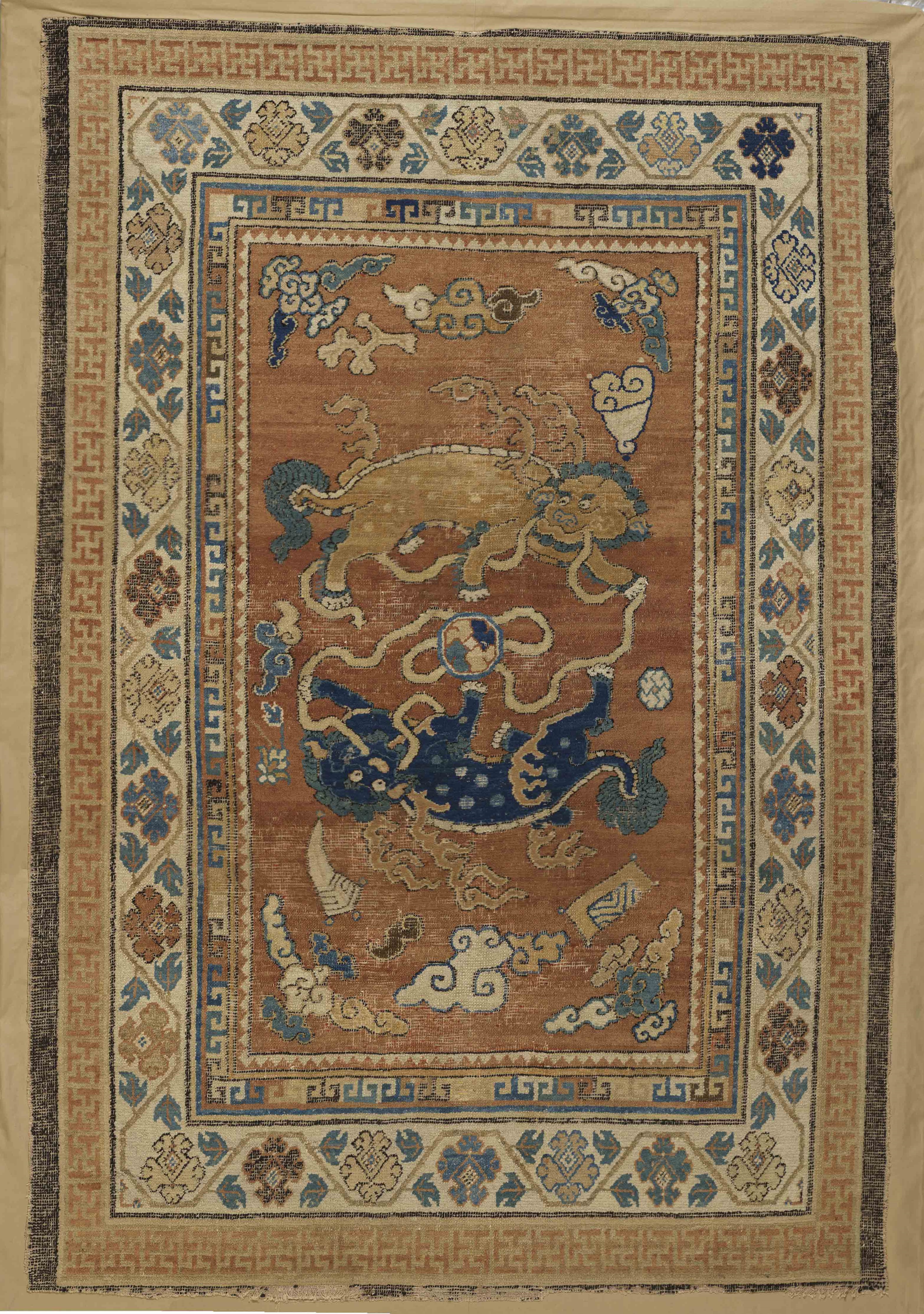 Carpet with “two lions playing with a ball” motif