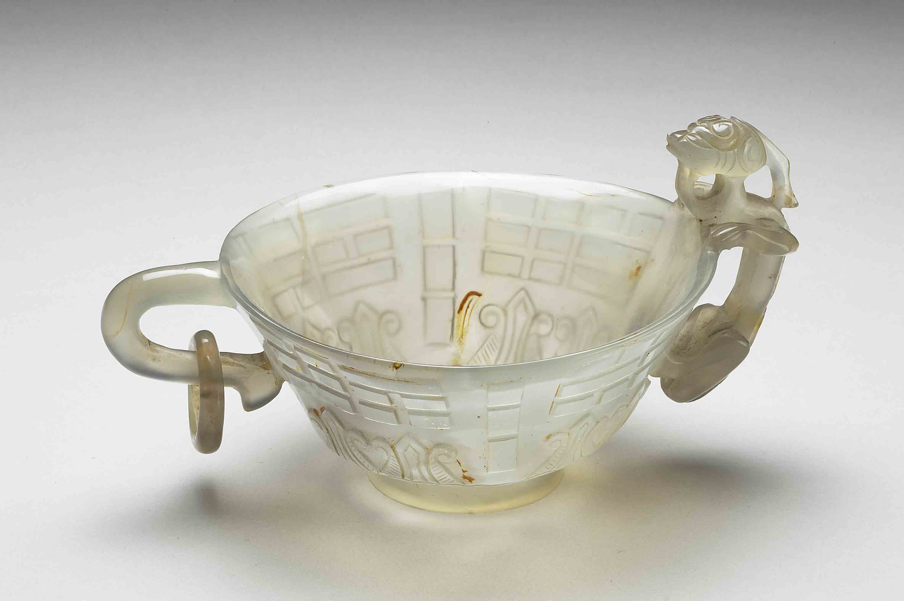 Agate cups, a saucer and a tray with Bagua motif