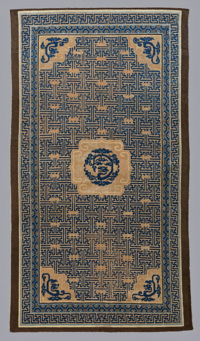 Carpet with swastika, bat, and foliated dragon motifs