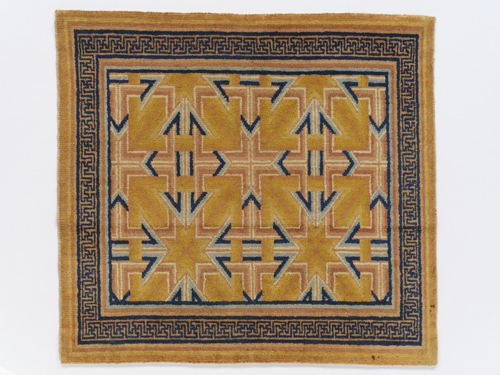 黃地幾何紋座毯