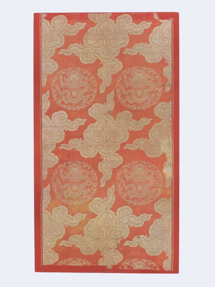 Red brocade with dragon roundels and clouds