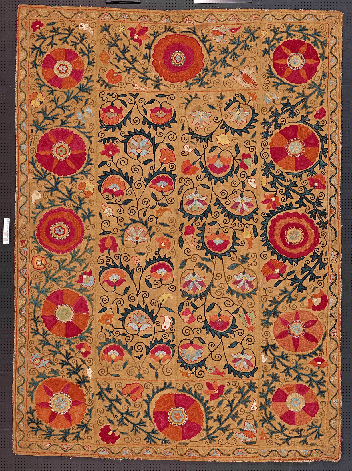 Yellow Suzani hanging with multicolor flower patterns